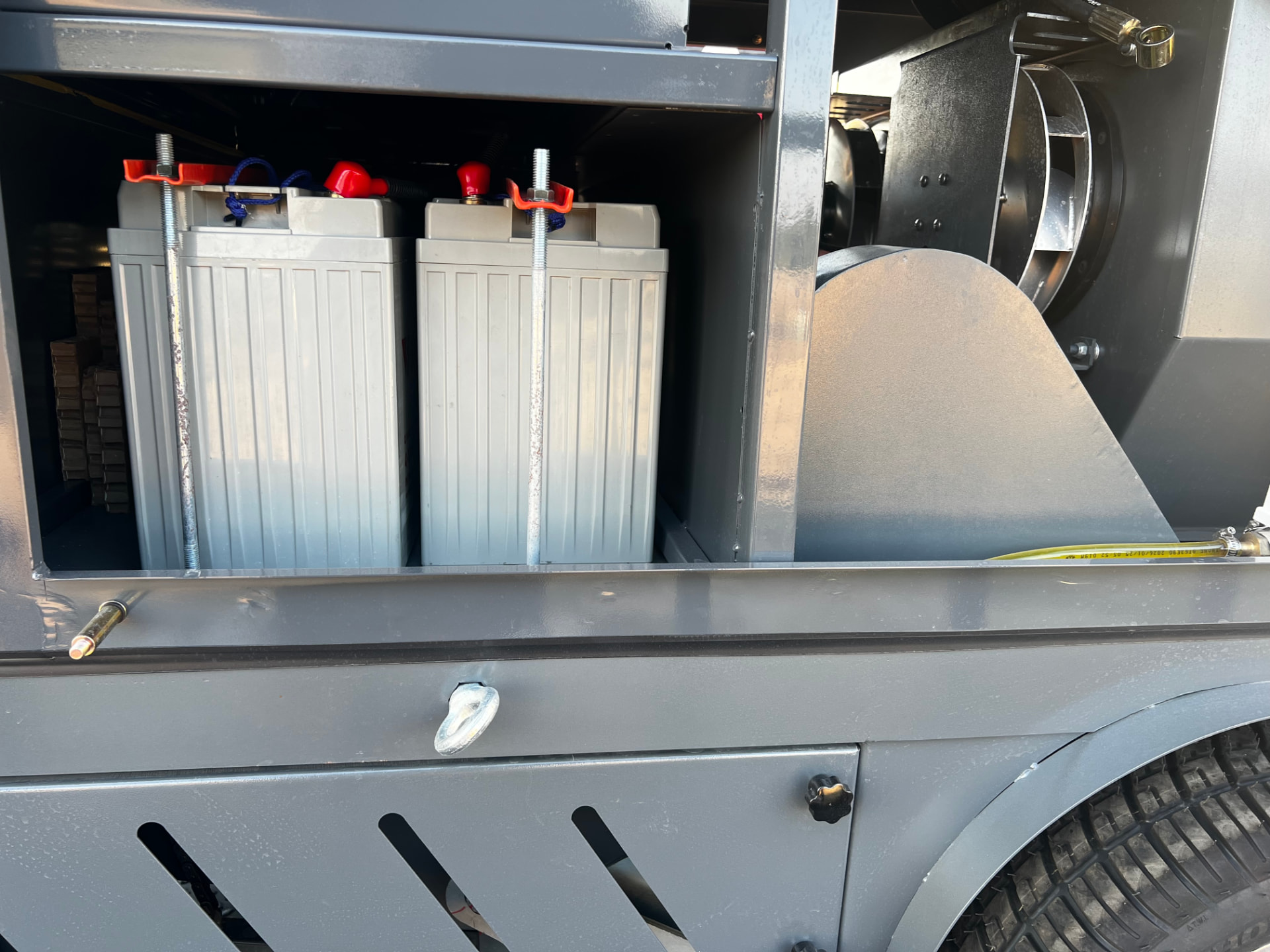 The TurfBoni™ battery-powered system installed inside the machine